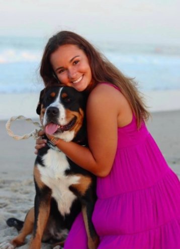 Girl with Pet dog on the beach